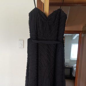 Tea-length black dress